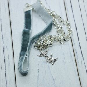 Upcycled necklace with small Bird pendants and velvet ribbon.